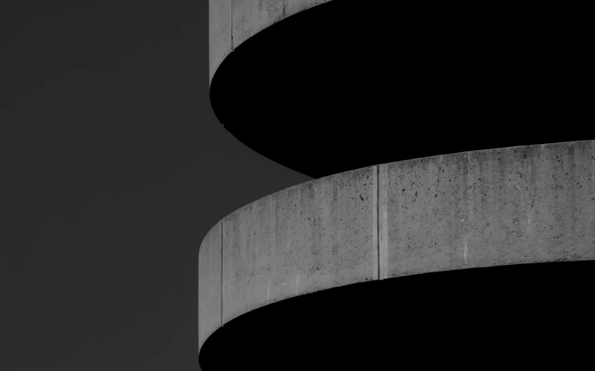 Curved concrete wall in soft light